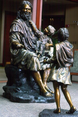 statue of Jesus with children