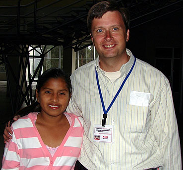 Mark with his sponsored child Karen