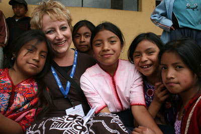 woman with group of Guatemalan children