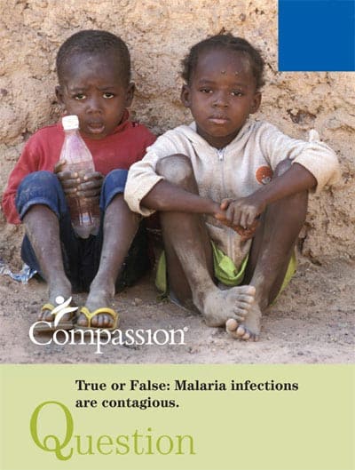 two boys sitting on ground for Compassion malaria poster