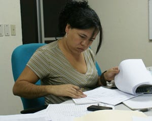 woman reviewing reports
