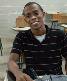 smiling young man in classroom