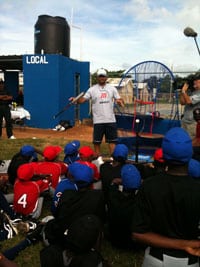 baseball coach with children