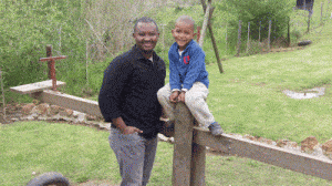 Jimmy Wambua with boy