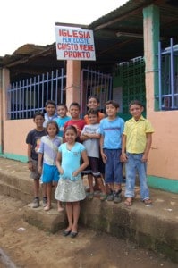 group of kids outside a Compassion center