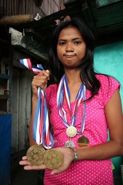 young lady with medals
