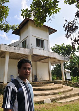 man standing in front of church building