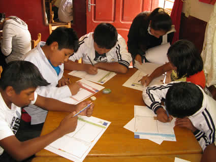 group of children writing letters