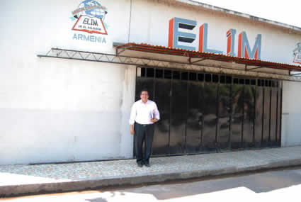 man standing outside of a church