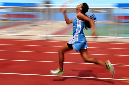 girl running on a track