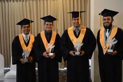 graduates holding awards