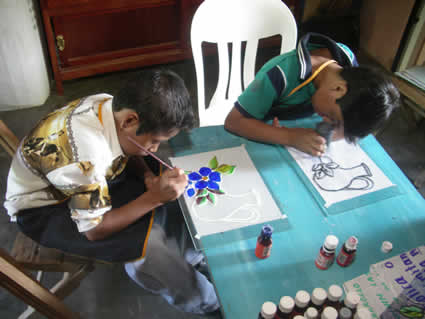 two children painting