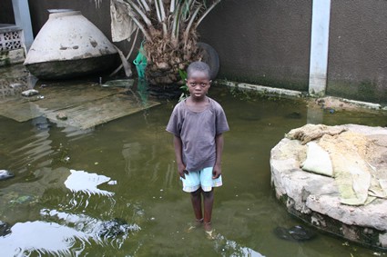 boy standing in water