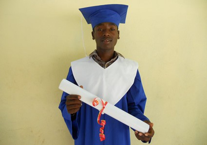 young man in graduation gown