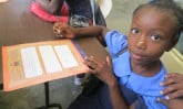girl-in-haiti-with-letter