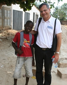 boy standing with his sponsor