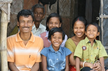 group with two men a woman and three children