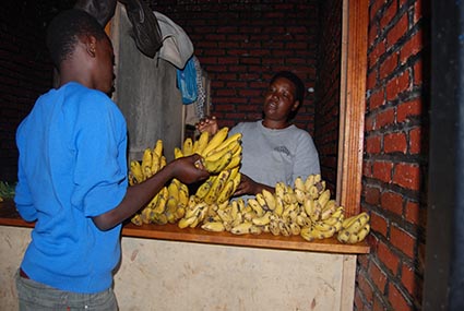 woman and boy with bananas