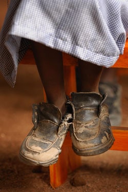 ending poverty old shoes