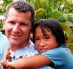 Scott with his sponsored child