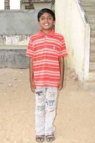 Young boy posing for a picture.