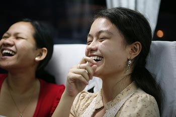 two girls laughing