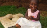 smiling Ugandan toddler