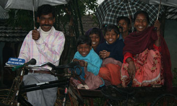 family with cycle van