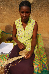 woman weaving basket