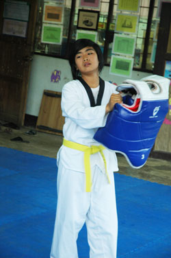 girl practicing martial arts