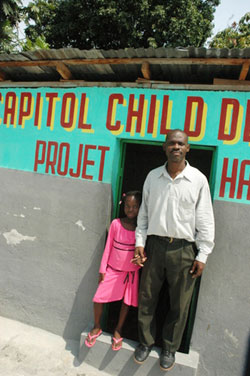 man and girl standing in doorway