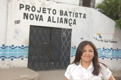 girl standing in front of a child center