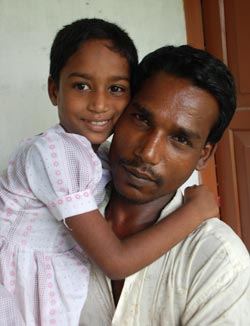 man holding a girl in his arms