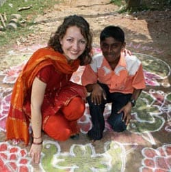 woman kneeling with boy