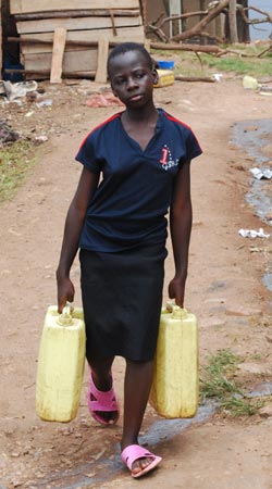 girl carrying water jugs