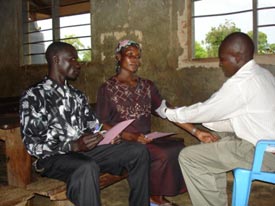 two men and a woman sitting