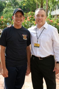 sponsor standing with his sponsored child