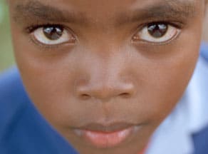 closeup of a serious looking child's face