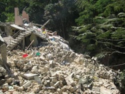 rubble of destroyed home