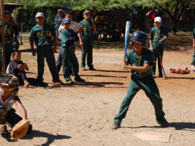 A batter and catcher near home plate