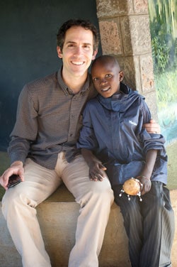 man and boy sitting together