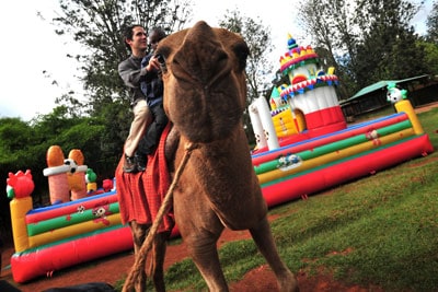 man riding a camel