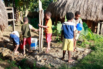 children fetching water
