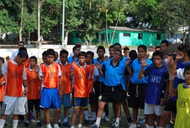 group of children in soccer uniforms