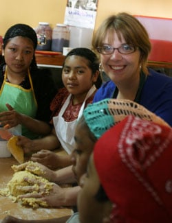 girls learning how to bake