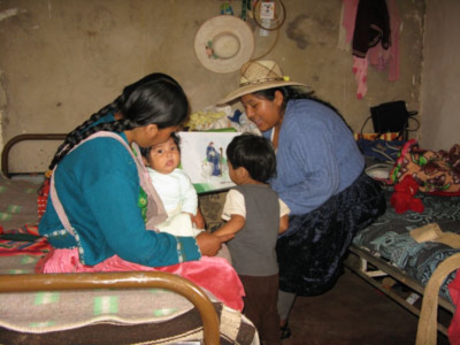 women with children inside home in Bolivia
