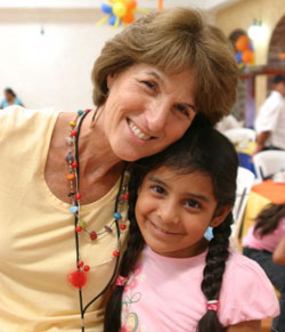 woman and young girl smiling for camera