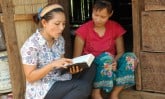 two women reading Bible