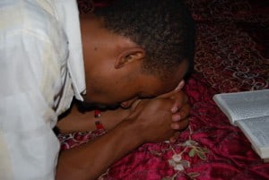 person praying