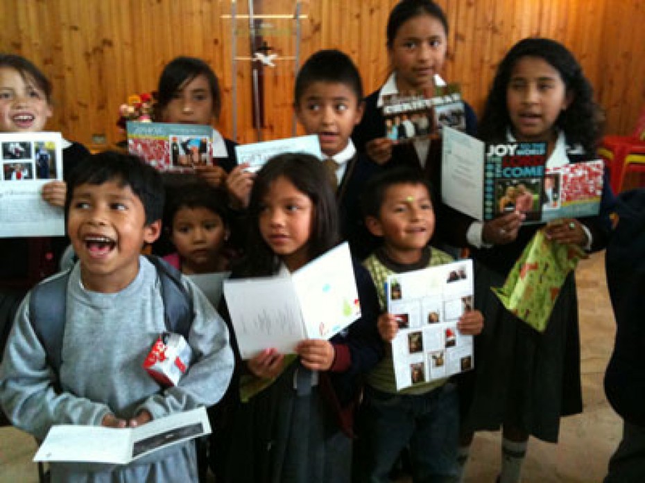 happy children holding letters